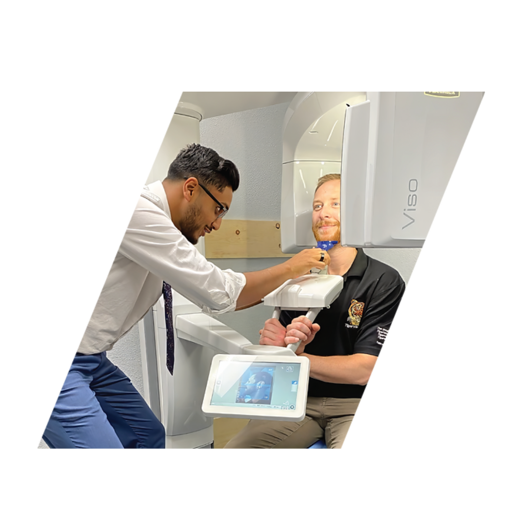 Dr. Vivek examining a patient